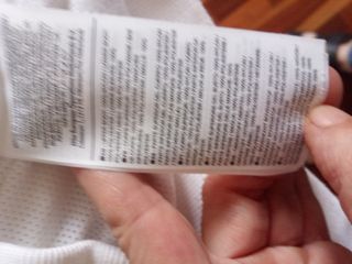 Chubasquero Nike gris y blanco