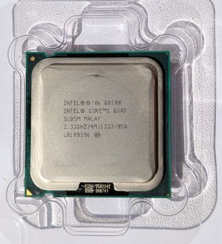 Intel Core 2 Quad Q8200+ventilador+2 Ram 2GB PC2. 