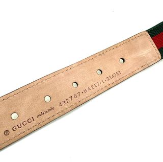 Cinturón Gucci elástico GG