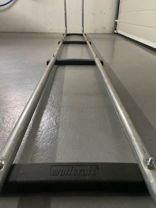 Soporte apilador para leña