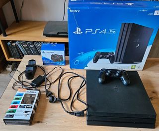 PS4 Pro 1TB + Cargador + 2 Juegos