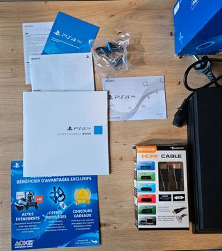 PS4 Pro 1TB + Cargador + 2 Juegos