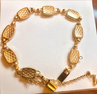 Pulsera chapada en oro con flores