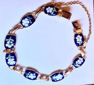 Pulsera chapada en oro con flores