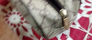Neceser o cartera de mano 