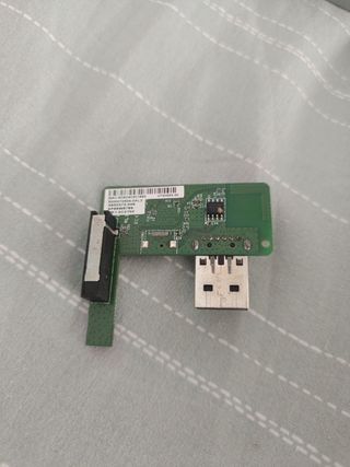 Lector de discos Xbox 360 S y modulo wifi