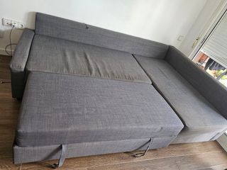 Sofá cama gris de tela