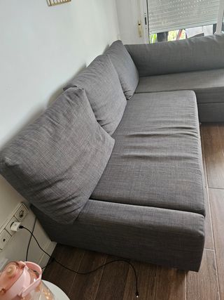 Sofá cama gris de tela