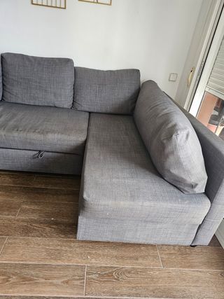 Sofá cama gris de tela