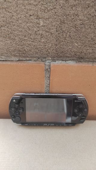 PSP Slim & Lite 2004 + Cargador + Memory Stick 1GB