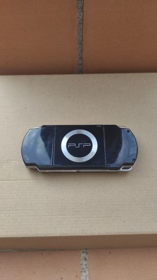 PSP Slim & Lite 2004 + Cargador + Memory Stick 1GB