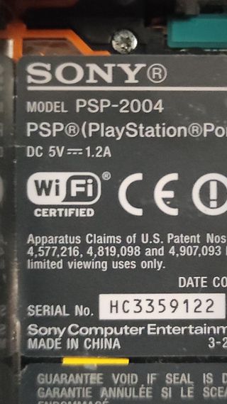 PSP Slim & Lite 2004 + Cargador + Memory Stick 1GB