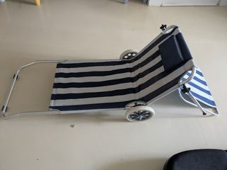 Hamaca de playa con ruedas y sombrilla