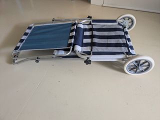 Hamaca de playa con ruedas y sombrilla