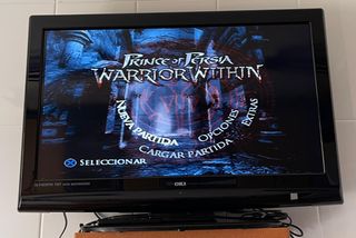 PlayStation 2 Negra con 2 mandos 
