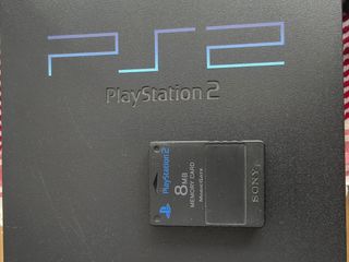 PlayStation 2 Negra con 2 mandos 
