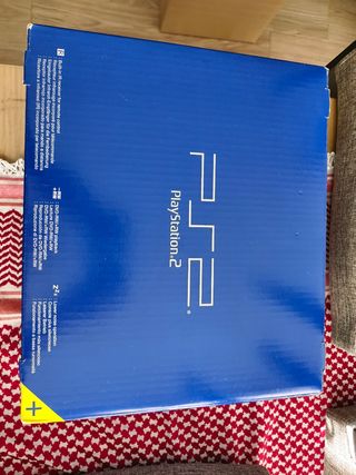 PlayStation 2 Negra con 2 mandos 
