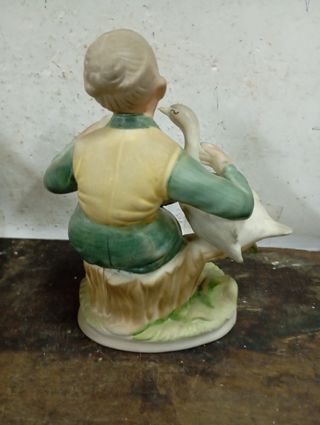 Liquidazione di Natale Figura anziana con cigno e