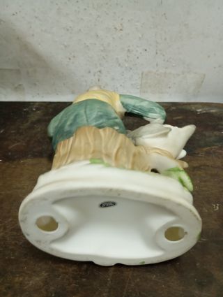 Liquidazione di Natale Figura anziana con cigno e