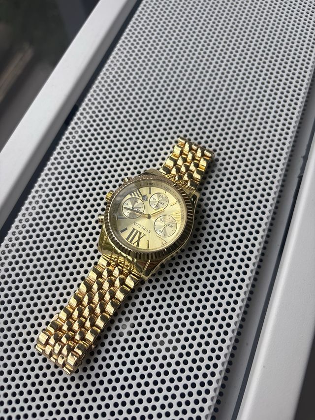 Reloj dorado Suppleon
Gold Suppleon Watch