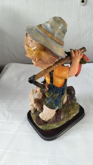 Figura niño campesino con perro