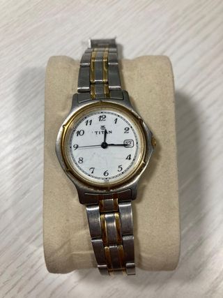 Reloj Titan bicolor