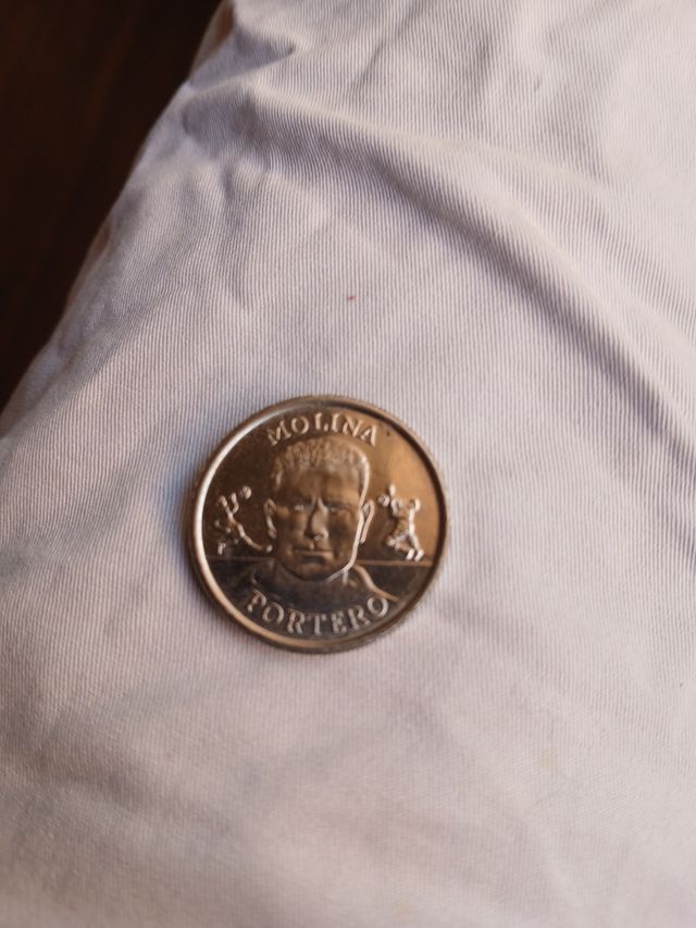 Moneda Portero Molina
