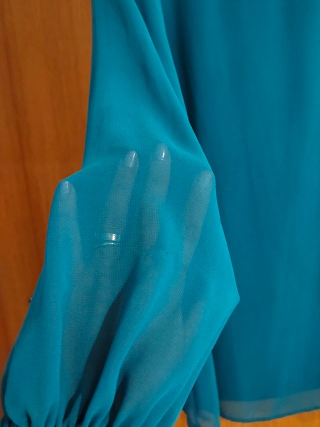 Vestido verde manga larga abullonada