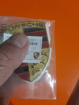 Emblema Porsche capo 
