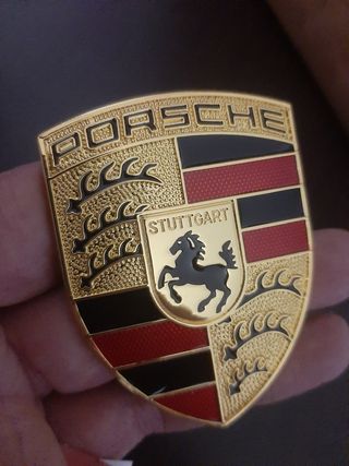 Emblema Porsche capo 
