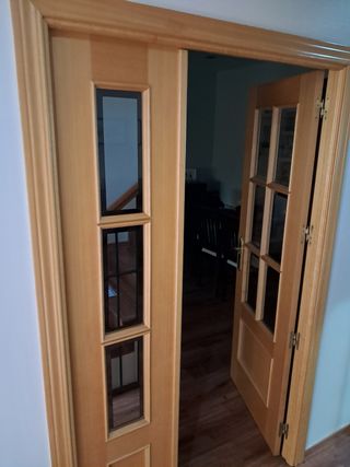 Puerta doble madera y cristal
