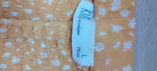Conjunto niña top de tirantes y falda pantalón.