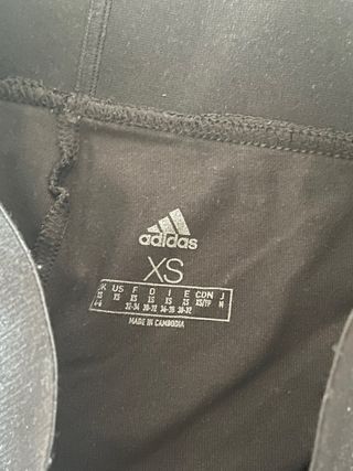 Leggings Adidas negros con rayas blancas