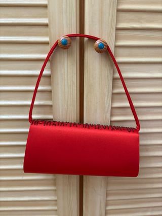 Bolso de fiesta rojo con pedrería