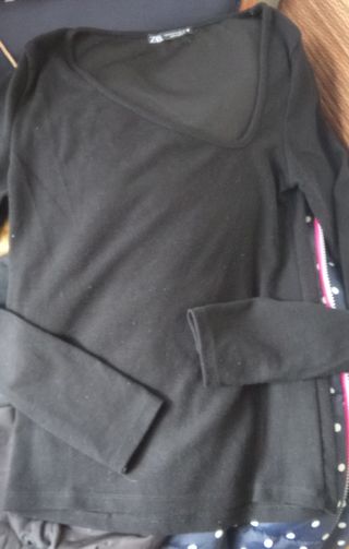 PUUM 
Jersey cuello asimétrico negro elá