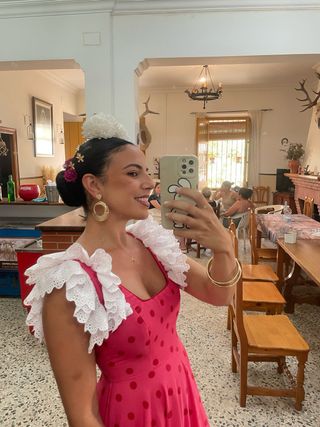 Traje de flamenca rosa con volantes