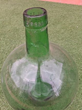 Damajuana antigua de cristal verde