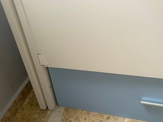 Cama nido azul y blanca