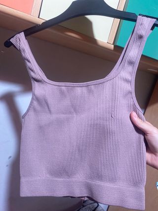 Top deportivo rosa con cremallera