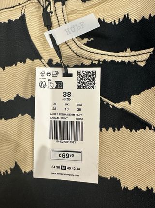 Pantalón tobillero acampanado estampado