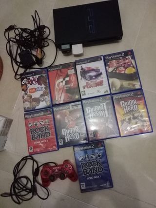 PlayStation 2 + mando + 9 juegos + 2 Guitarras