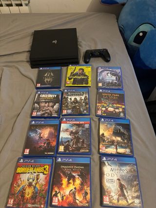 Consola PS4 + 14 Juegos PS4 y PS5