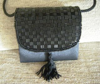 Bolso de fiesta negro con abalorios