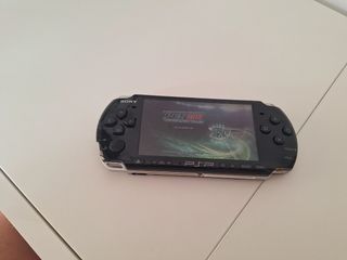 Sony PSP 3004 Slim Negra + 3 Juegos .
