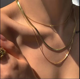 Collar doble capa de
oro 18k  elegante y refinado 