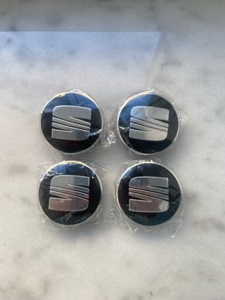 Tapabujes Seat 63mm Negro Plata (4 Unidades)