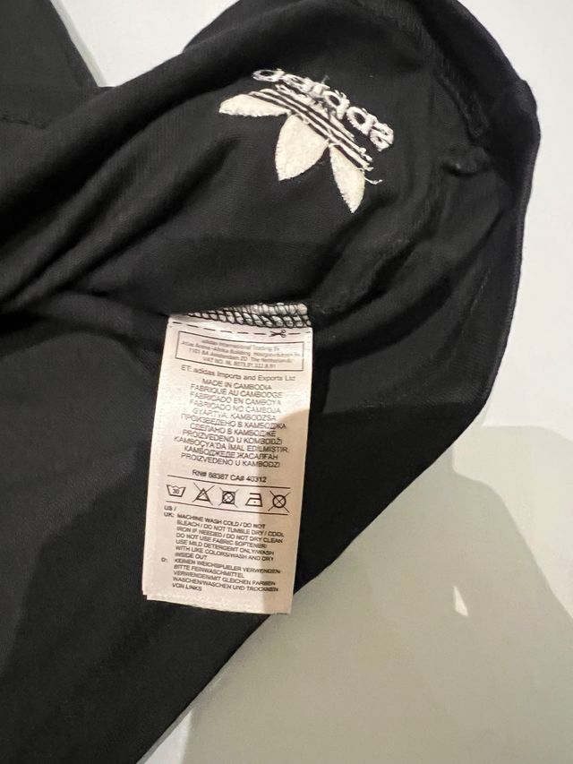 Maglietta Adidas nera con strisce Taglia S