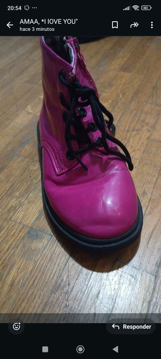 Botas rosas y negras talla. 31