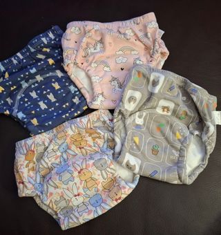 4 bragas de transición para bebé
Y silla juguete