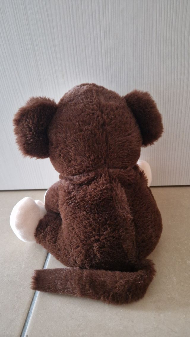 Peluche mono con saco de semillas para calentar.